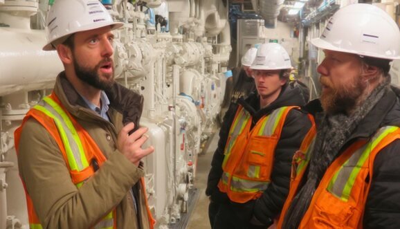 Engineers inspecting a plant room