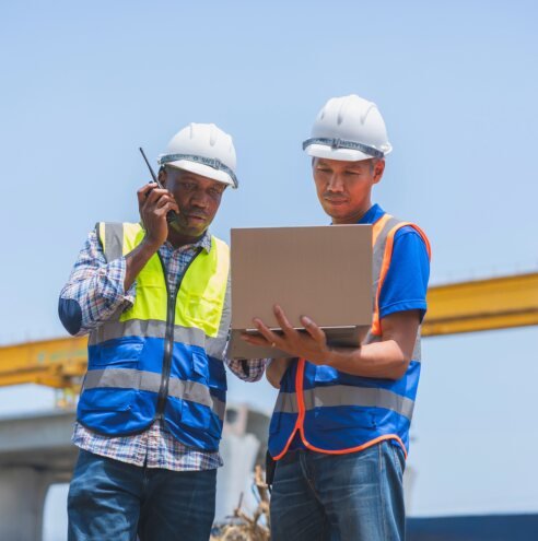 Site supervisors reviewing plans