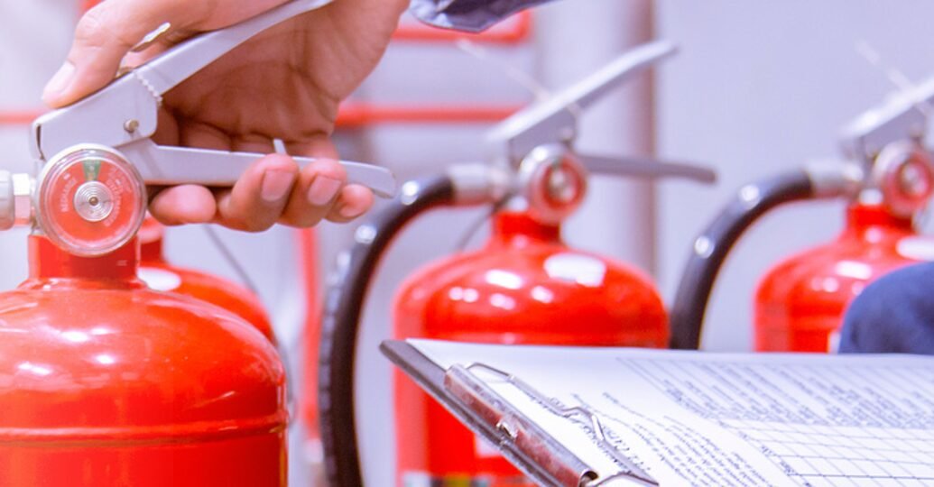 Fire extinguisher inspection by a Khushab International technician