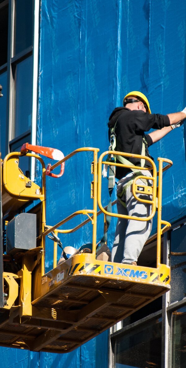 Worker on a scissor lift