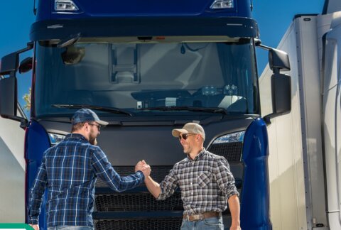 Khushab International drivers inspecting a truck